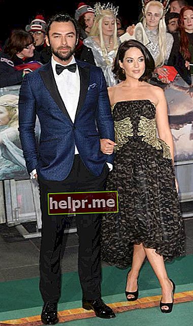 Aidanas Turneris ir Sarah Greene pasaulinėje filmo „Hobitas: penkių armijų mūšis“ premjeroje 2014 m. gruodžio mėn.